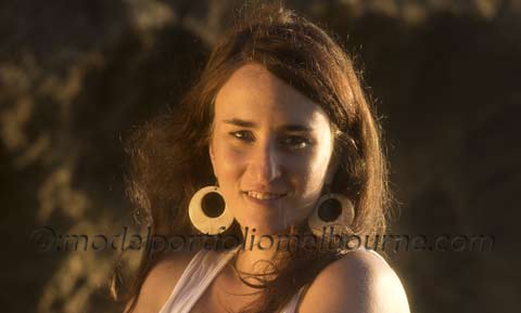 headshot portrait of swimwear model in white